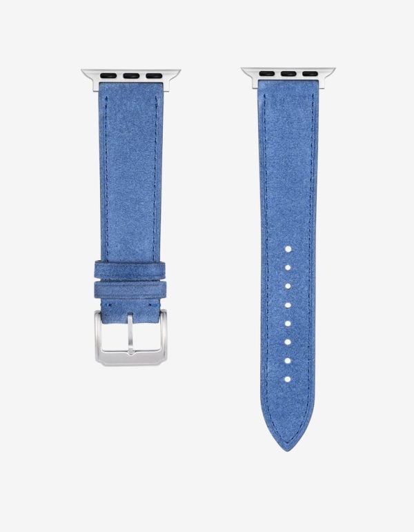 ocean blue suede watch strap laid flat with the silver apple watch adapter fitted at the lug end