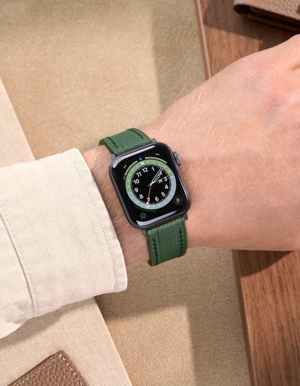 apple watch on a military green wristbuddys fkm rubber band, on the wrist