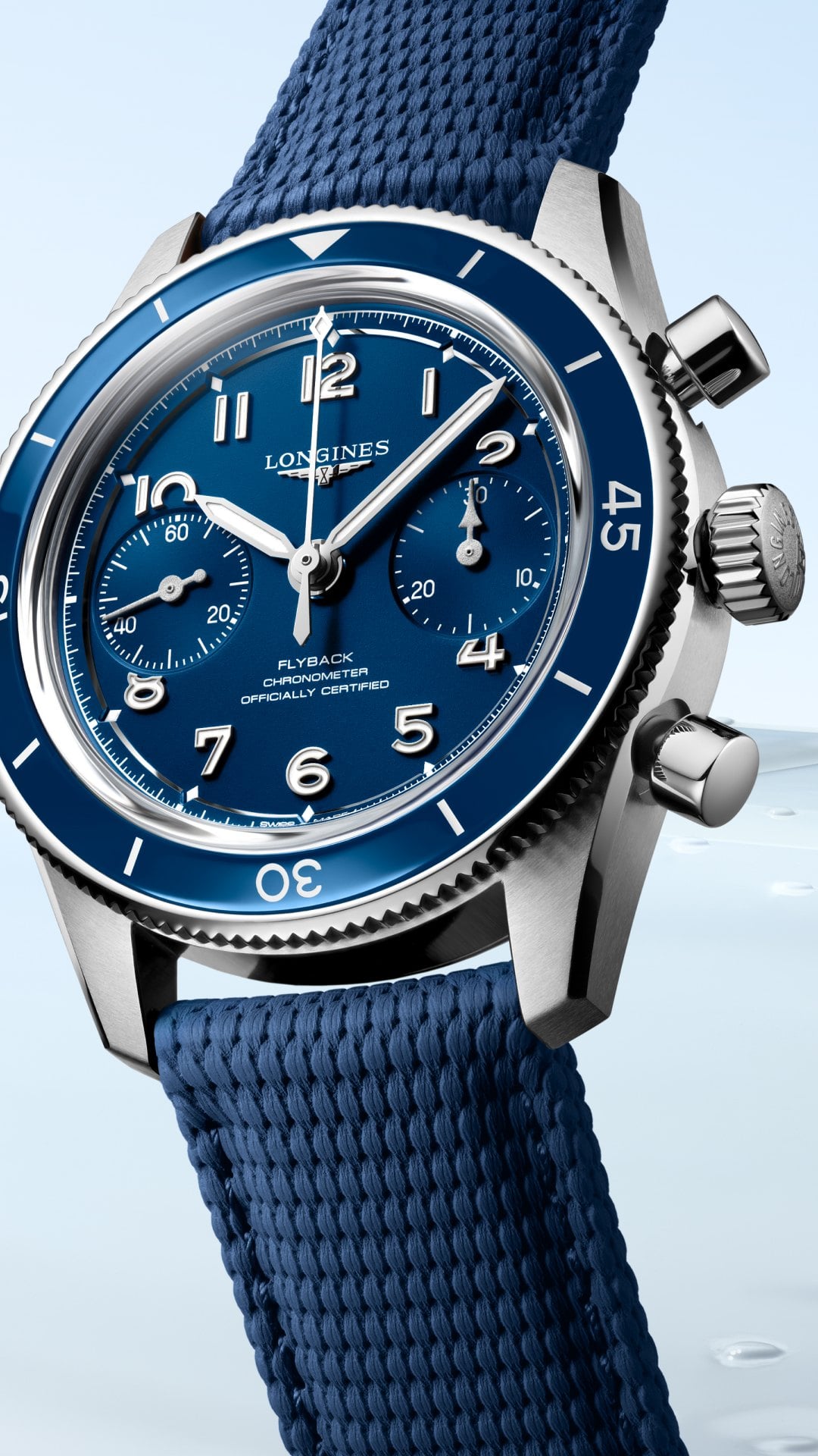 Longines spirit pilot flyback med blå urtavla, blå lünett och kronografräknare longines spirit pilot flyback med blå urtavla, blå lünett och kronografräknare