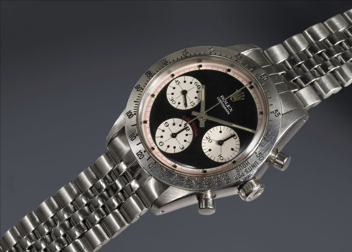 rolex cosmograph daytona med svart urtavla och kontrasterande räknare på stållänk