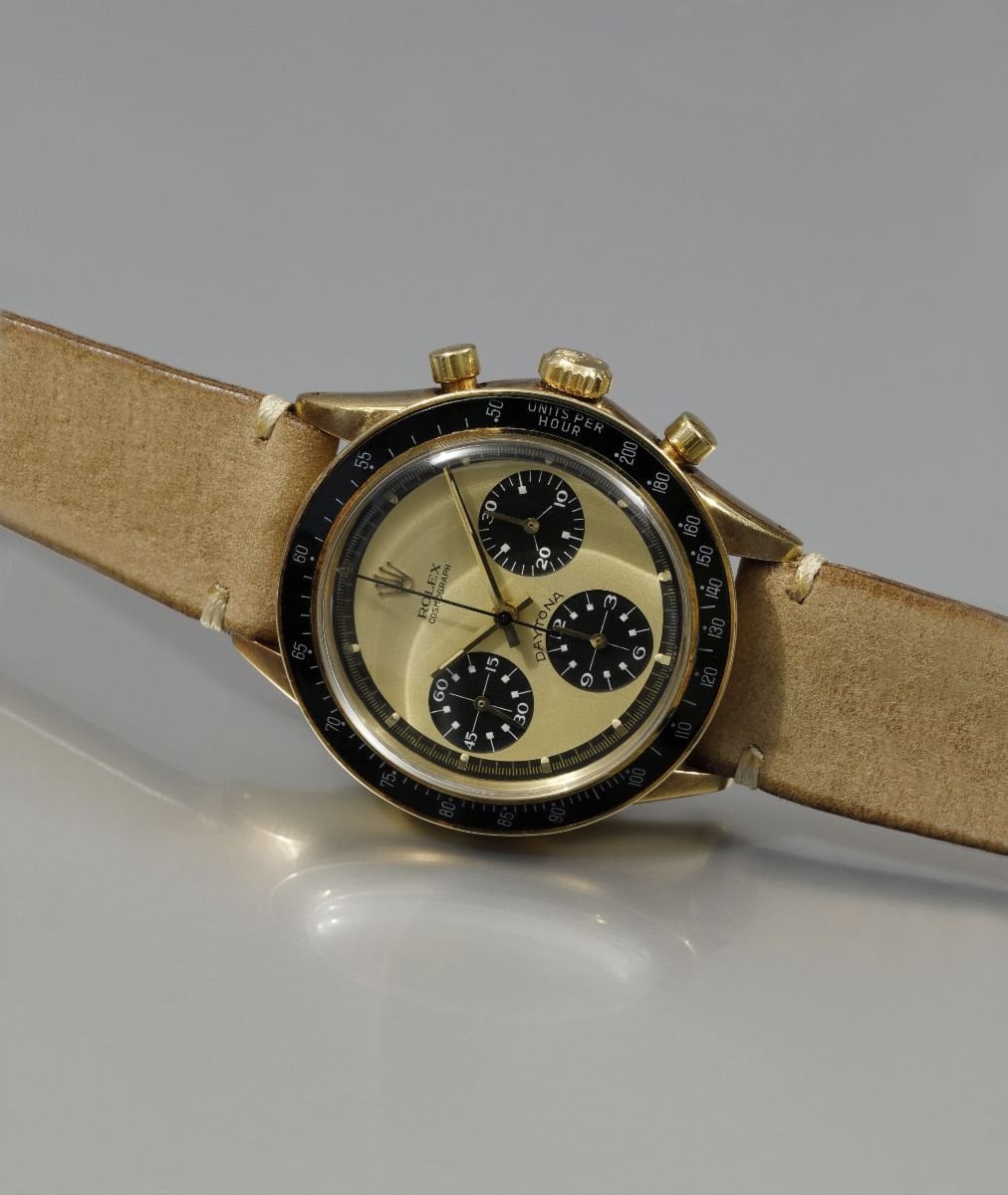 rolex paul newman daytona i guld med champagnefärgad urtavla ur pucci papaleo-samlingen
