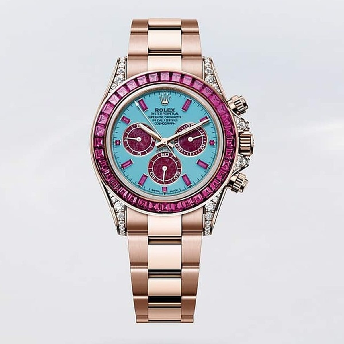 Rolex cosmograph daytona sommar i everosegold med turkos urtavla och rosa safirer rolex cosmograph daytona sommar i everosegold med turkos urtavla och rosa safirer