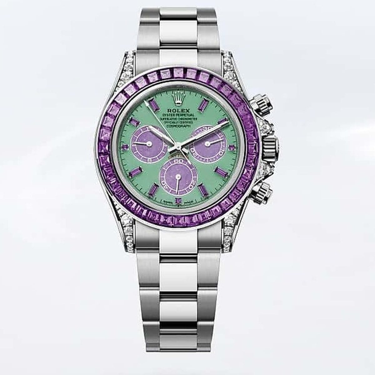 Rolex cosmograph daytona vår i vitguld med urtavla i krysopras och ram med violetta safirer rolex cosmograph daytona vår i vitguld med urtavla i krysopras och ram med violetta safirer