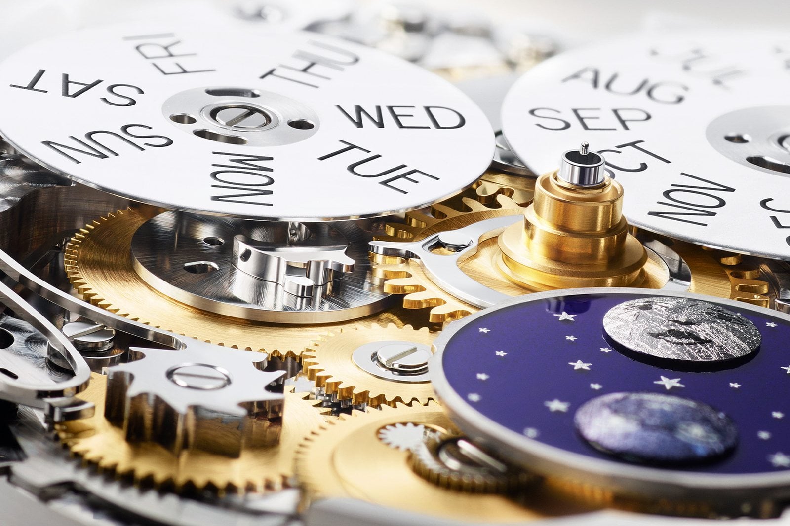 kalenderskivorna i rolex kaliber 7190 – veckodags- och månadsskivor tillsammans med den blå emaljerade månfasskivan